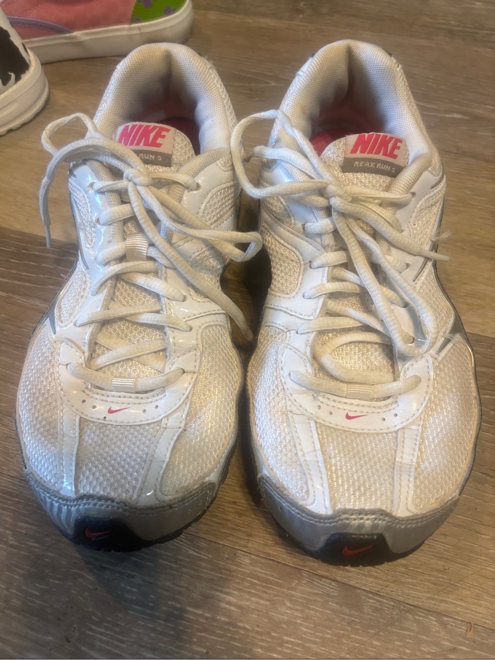 Nike White Sneakers with Pink Accents